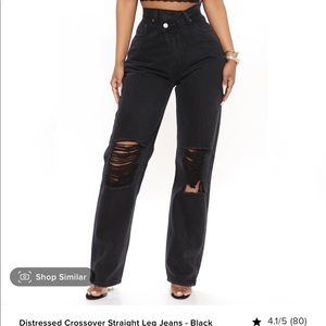 Fashion Nova Black distressed jeans. Never worn. Size 3- fits oversized.